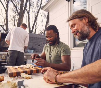 Rashad Evans and Jake Plummer cooking mushrooms